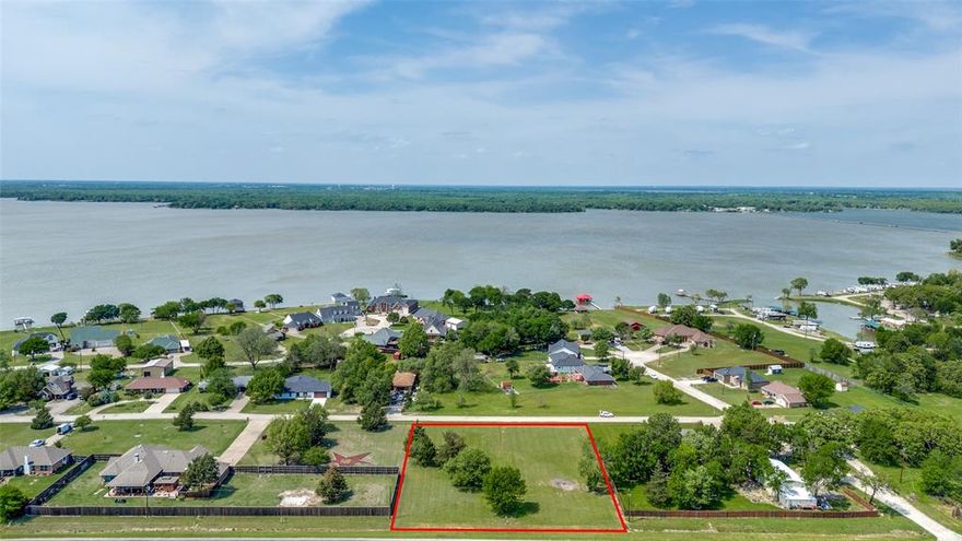 Prime Location to Build Your Dream Home on Lake Tawakoni! Located in a beautiful waterfront community of custom homes, this property includes two lots totaling approximately 1 acre. Enjoy peace and privacy in this tranquil setting with exclusive access to a private waterfront park and boat ramp—ideal for fishing, skiing, boating, picnicking, or simply relaxing as you watch the sun set over the lake each evening and making memories with loved ones. Don't miss this rare opportunity—come see it today before it's gone!