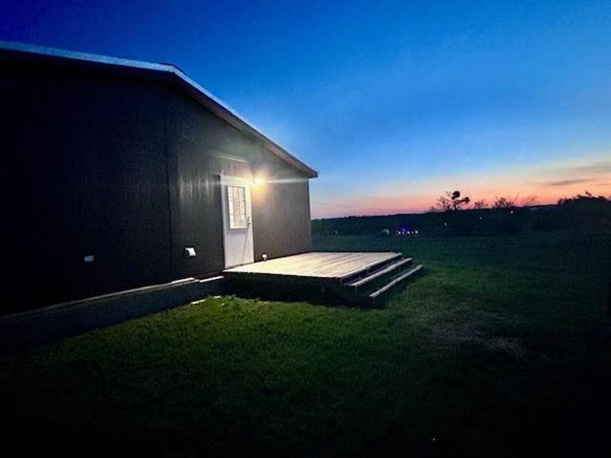 Not located in a mobile home addition, and only 6 miles from stephenville, this gem is a must see! Starting with a fresh modern interior and sitting on nearly 3 acres of private land, this completely updated 3 bedroom, 2 bathroom home offers the perfect blend of country living and contemporary style. Interior highlights start with a bright open floor plan featuring fresh paint and brand new wood-look vinyl flooring that flows seamlessly through every room. The kitchen, the heart of the home, boasts new cabinetry, countertops and a suite of brand-new stainless steel appliances. Both bathrooms have been refreshed with new sinks,  toilets and countertops for a clean, modern feel. On the exterior, a brand new metal roof provides long-term durability and piece of mind along with new porches, a newly built well house and a new well pressure pump. The exterior of the home has also been freshly painted. A 20x40  container provides plenty of storage space or a place to put all of your outdoor equipment along with feed and tack. The perimeter of the property is fenced and, with a little extra care, would be horse ready.