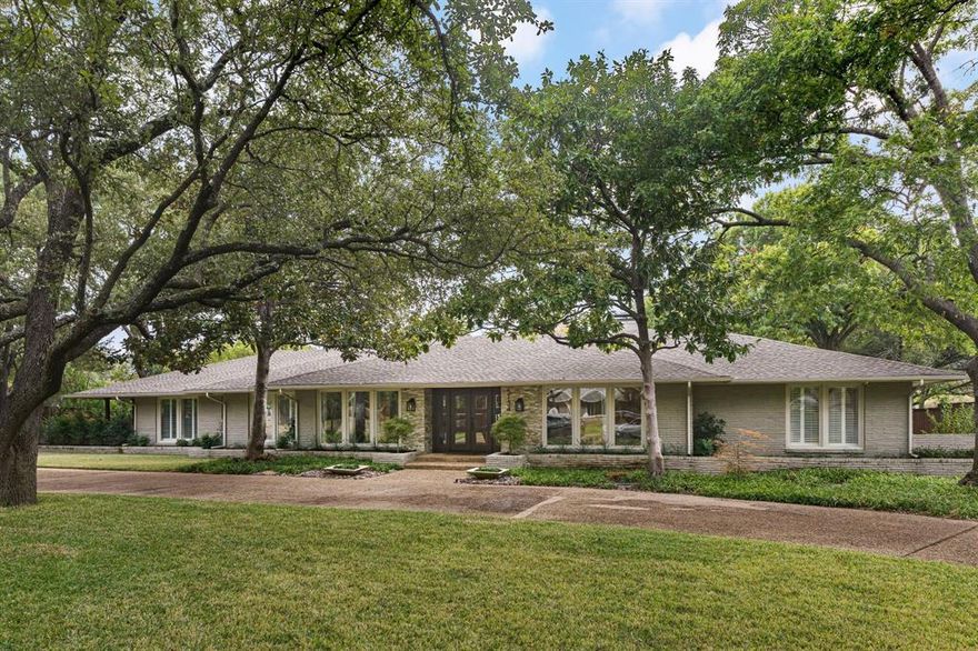 A true dream: this beautifully updated 4-bed, 3.5-bath residence is nestled on a sprawling lot in Russwood Acres, offering the ultimate in luxury living. Perfectly designed for both relaxation and entertaining, this property boasts an array of top-tier amenities that will make every day feel like a vacation. The layout is ideal with split formal areas, elevated ceilings and a spacious, open living area filled with natural light and modern finishes. The home features a striking, updated gourmet kitchen with double marble islands. Each of the four generously sized bedrooms offers comfort and privacy, with the primary suite serving as a true retreat, complete with a spa-like ensuite bathroom and large walk-in closet. Outside, your private oasis awaits. Enjoy endless fun in the sparkling swimming pool, or challenge friends to a game on the pickleball and basketball courts. There is also a custom putting green, pool house with full bathroom, built-in grill area and a covered heated patio.