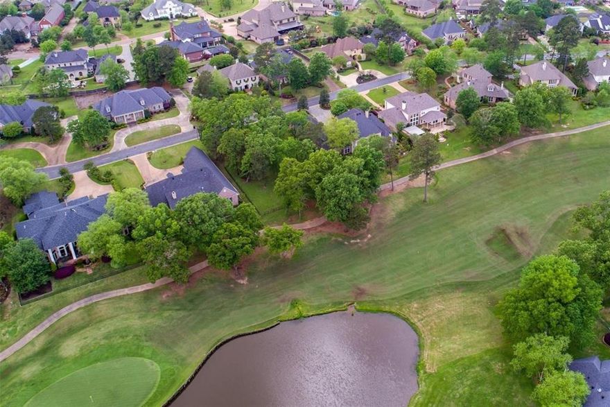 Beautiful Southern Trace golf course lot located on signature Hole 17, offering exceptional views of the 17th green and the lake that surrounds it. This premier homesite on Belle Cour Way is one of the finest in Southern Trace and is ideal for building your dream home. The lot is build-ready with minimal preparation required, on a fully developed street with no nearby construction and mature landscaping already in place. Enjoy the privacy and prestige of this coveted, gated golf course community, along with access to neighborhood parks, walking trails, playgrounds, country club, tennis courts, pool, and championship golf course amenities. A rare opportunity to secure a premium lot in an established and highly desirable community.