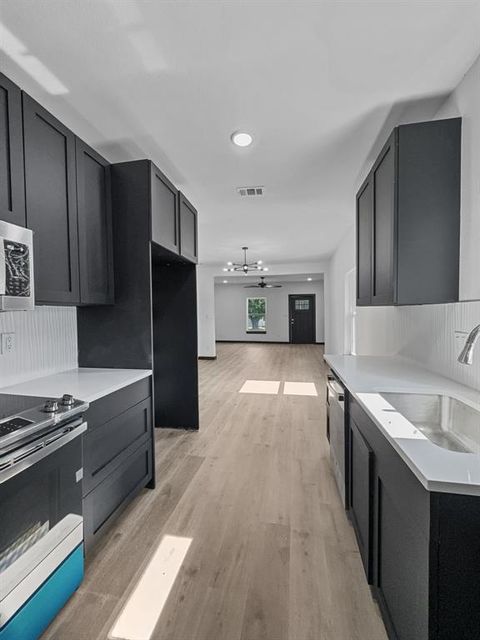 Photo of 3603 Mcdougal Street, Greenville, TX 75401 (MLS # 21264353)