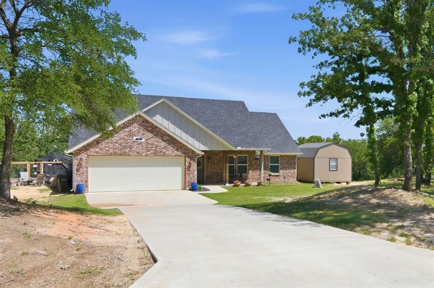 Welcome home to this better-than-new home, where peaceful country living meets modern comfort, nestled on this almost 2-acres. This beautiful home features an inviting open-concept layout filled with natural light, ideal for everyday living and entertaining. The kitchen includes an island that flows seamlessly into the living and dining areas. The home offers 3 bedrooms, and 2 bathrooms, including a separate primary suite with a private bathroom with a walk-in shower and a large walk-in closet. There is a two-car attached garage and a separate utility-laundry room. Enjoy wide-open Texas skies from your backyard, with plenty of room for outdoor living or your animals. The raised garden beds and storage building with heat-ac and electricity (currently being used as an office) stay with the property. Don't miss your opportunity to own a little slice of Parker County tranquility.