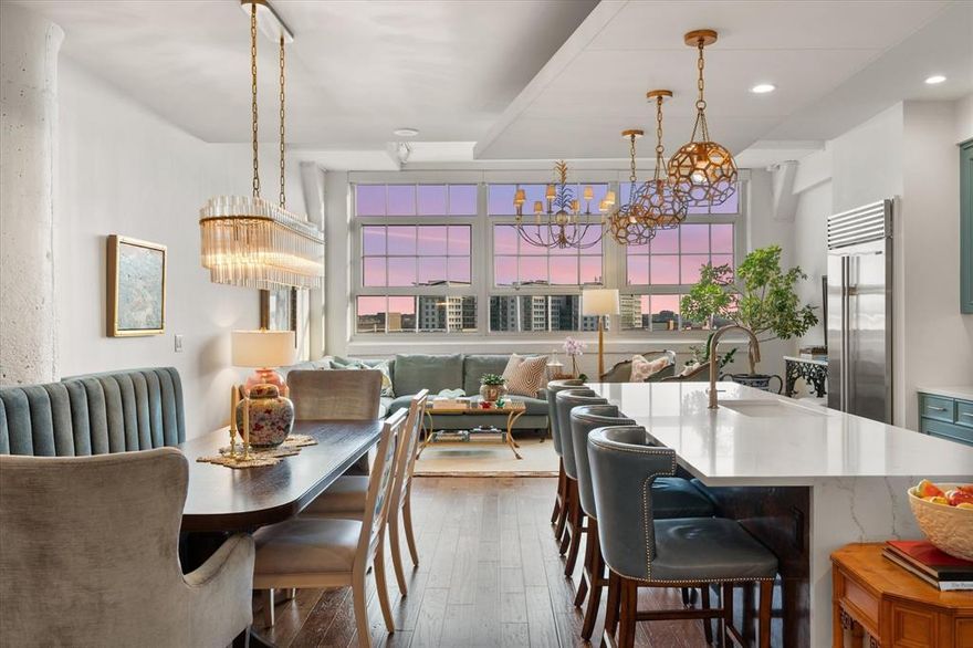 Live above it all at Montgomery Plaza, where historic architecture meets refined living in the heart of Fort Worth’s coveted West 7th district.

Residence #2638 is a beautifully curated 2-bedroom, 2.1-bath condo that stands apart with elevated finishes, custom details, and breathtaking southern-facing views stretching over Trinity Park toward TCU — delivering spectacular sunset light that pours through the home’s signature oversized windows.

Designed for both everyday living and effortless entertaining, the open-concept layout centers around a stunning chef’s kitchen featuring Sub-Zero refrigerator, generous prep space, under cabinet lighting, and seamless flow into the dining and living areas. Just beyond, a striking custom wet bar with rich cabinetry, cabinet and counter lighting, and beverage refrigeration creates a true entertaining moment — equal parts functional and unforgettable.

The interiors feel layered and intentional, with curated lighting, tailored wall coverings, and high-end finishes throughout. The guest suite is enhanced by custom built-ins, offering flexibility as a sophisticated home office, library, or private retreat.

The spacious primary suite provides a serene escape with a blackout window shade and spa-inspired bath, while the additional powder bath adds convenience for guests.

Set within the iconic Montgomery Plaza — a landmark Fort Worth residence — amenities include a resort-style rooftop pool, fitness center, media room, concierge services, and secure parking, all just steps from premier dining, shopping, and entertainment.

This is lock-and-leave luxury with architectural character, exceptional light, and a level of finish rarely found — all in one of Fort Worth’s most vibrant urban settings.