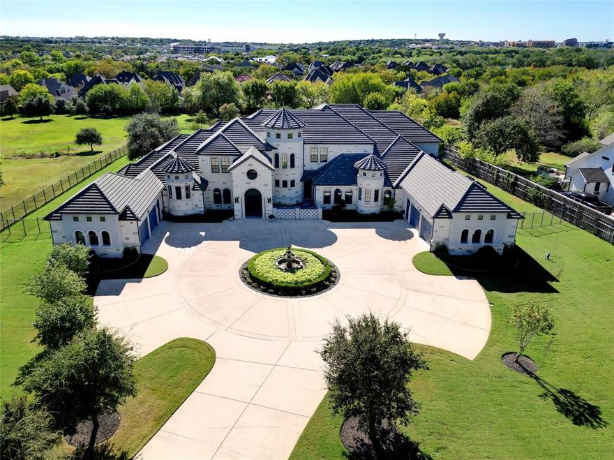 ABSOLUTELY STUNNING! LOCATED ON 1.89 ACRES IN THE HEART OF SOUTHLAKE*MEDITERRANEAN DESIGN*PRIVACY ABOUNDS! PEACEFUL & SERENE*NO EXPENSE SPARED*TOP OF THE LINE EVERYTHING*AUSTIN STONE EXTERIOR WITH CAST STONE ACCENTS*POOL, SPA, SPORT COURT & OUTDOOR LIVING WITH GRILL, GREEN EGG, BAR & FRIDGE*PATIO SHADES, ALUMINUM SHUTTERS PROVIDE PROTECTION FROM ANY STORM*THIS WONDERFUL SPACE ALSO OFFERS FIREPLACE, SLIDING DOORS, HIBACHI BAR & AMPLE STORAGE CABINETS*ELEVATOR* CUSTOM CRYSTAL LIGHT FIXTURES THROUGHOUT, ESPECIALLY IN ENTRY HALL WITH FLORAL CRYSTAL DESIGN*MUSIC ROOM*BILLIARDS ROOM,MEDIA ROOM, CURVED CUSTOM BAR W SPECIAL LIGHTING*2 FIREPLACES*WELL FOR IRRIGATION*SEPTIC*ALL BEDROOMS HAVE EN-SUITES*2ND LEVEL OFFER 2 BEDROOMS W EN-SUITES,GAME ROOM & 2ND STORY LIBRARY* PRIMARY SUITE IS SECOND TO NONE WITH HIS & HER BATHS, DRESSING AREA, SITTING AREA, CUSTOM CLOSETS WITH ALL BELLS AND WHISTLES*STORAGE FOR THE BEST WARDROBES AND SHOE COLLECTIONS IMAGINABLE*HIS AND HER STUDY*KITCHEN FEATURES PANTRY WITH PULL OUT SPICE DRAWERS,TOP OF THE LINE THERMADOR APPLIANCES, CATERING KITCHEN, SUB ZERO, 4 OVENS, STEAMER, CUSTOM PULLOUTS, WHITE PEARL MARBLE COUNTERS, BUILT IN CHINA CABINET, WINE FRIDGE, 2 DISHWASHERS & MORE*EXQUISITE MILL AND TRIM WORK*5 BEDROOMS*5 FULL BATHS*3 HALF BATHS*16 TOTAL ROOMS*BORAL CONCRETE TILE ROOF, QUALIFIES FOR INSURANCE DISCOUNT*MOROCCAN THEMED BEDROOM ON 1ST LEVEL*ELABORATE SECURITY SYSTEMS & CAMERAS CONVEY*IRON SECURITY GATE*FOAM ENCAPSULATED*AMAZING STORAGE FOR EVERY SEASON*SECURITY GATE & AUTO COURT, NEW EPOXY FINISHED FLOORS*CIRCLE DRIVE*FRONT FOUNTAIN*4 CAR GARAGE, DIVIDED WITH 2 CAR GARAGES ON EACH SIDE OF HOME*4 PARKING SPACES*CARROLL ISD*NO HOA* SEE DRONE VIDEO,360 TOUR & COMPLETE AMENITIES & UPGRADES LIST ON NTREIS TRANSACTION DESK*BUYER REQUIRED TO PROVIDE PROOF OF FUNDS OR LENDER LETTER SHOWING THEY QUALIFY FOR THE SALES PRICE BEFORE SHOWING CAN BE SCHEDULED, SELLER TO REVIEW ALL DOCUMENTS**SEE CURRENT APPRAISAL FOR 5.1M-PRICED BELOW APPRAISAL!!!