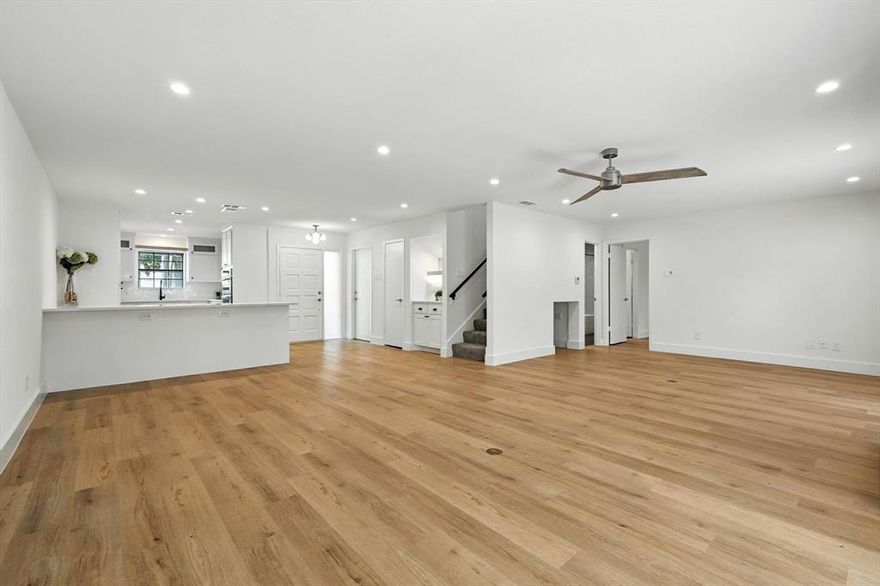 Welcome to 2143 Kessler Court #38, a show-stopping, fully renovated townhome in the coveted Highland Condos community—just minutes from Bishop Arts, Trinity Groves, and downtown Dallas. This impeccably updated home blends modern elegance with thoughtful functionality in a prime location. Step inside and be wowed by the completely reimagined open-concept layout, where walls and arches were removed to create a seamless flow between the kitchen, dining, and living areas. Luxury vinyl plank flooring stretches across the entire first floor, adding warmth and durability to the space.The chef’s kitchen is a true masterpiece, featuring all-new custom cabinetry, sleek quartz countertops, a stylish white subway tile backsplash, and a stainless steel single-basin sink. Premium LG appliances include a five-burner electric cooktop with a stainless steel vent hood and a convection microwave and separate oven. The extended countertops provide the perfect spot for casual seating or entertaining buffet-style, making it an ideal space for gatherings. The first-floor bedroom and full updated (and gorgeous) bathroom offer flexibility for guests or a home office, with a chic, modern aesthetic and high-end updated fixtures. Upstairs, you’ll find two additional spacious bedrooms and another beautifully remodeled bathroom featuring dual sinks, a tall quartz-topped vanity, and one of the largest walk-in showers you’ll see in a property this size—complete with a built-in bench for spa-like relaxation. A bonus enclosed space above the entry adds incredible versatility, ideal for a home office, gym, reading nook, or secondary living area. Head outside to enjoy your own private courtyard—a peaceful spot to unwind or entertain. Don’t miss your chance to own this designer-renovated gem in one of Dallas’ most desirable locations. Modern comfort, functional design, and unbeatable access to the city’s best dining, shopping, and entertainment—all in one exceptional package.