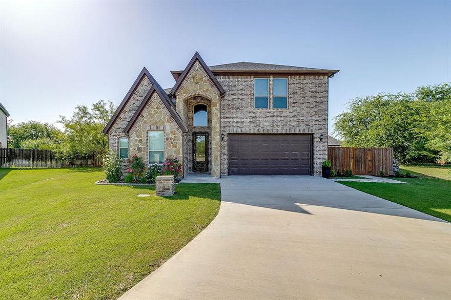 Exquisite home nestled on an oversized lot in a quiet cul-de-sac, located in the highly sought-after Aledo ISD!

The thoughtfully designed layout includes a primary suite complete with a spa-like soaking tub and walk-in shower with a versatile study—which can serve as a fourth bedroom—on the main level, while a spacious loft, two additional bedrooms, and a full bath await upstairs. Luxury vinyl plan wood flooring flows throughout, complementing the chef’s kitchen, built-in coffee and wine bar, and charming mudroom nook off the garage. The striking fireplace with a newly updated mantle extends to the tall ceilings, creating a stunning focal point. Outside, the private backyard is an entertainer’s dream featuring an extended covered patio perfect for hosting gatherings featuring a built-in grill. 

Plenty of space to play, making this property perfect for those who have dreamed of having fewer neighbors, just outside the hustle and bustle of the city, with easy access to shopping, dining, and close proximity to Downtown Fort Worth! Get outside of city limits; enjoy the stars; this home is a true must-see!