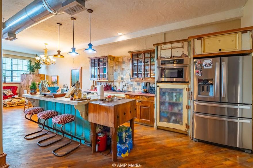 Introducing a truly one-of-a-kind property that blends exceptional craftsmanship with a unique architectural style. This stunning 4,800-square-foot home, nestled in the heart of Jones County, offers an unparalleled living experience. Boasting two impeccably designed stories, this property features not one, but two fully equipped kitchens, allowing for versatile living arrangements that can cater to a variety of lifestyles. The layout enhances the property’s flexibility, allowing you to configure it into multiple bedrooms, making it ideal for multi-generational living or hosting guests.Step outside and discover the remarkable rooftop patio, where you can bask in the best views the county has to offer, complete with a refreshing outdoor shower. An additional apartment on the back side of the property presents an income-generating opportunity, further highlighting its versatility and potential as a profitable investment. This is not just a home – it's a masterpiece of design and craftsmanship, offering a one-of-a-kind vibe that you simply must experience. Don’t miss your chance to make this exceptional property your own.