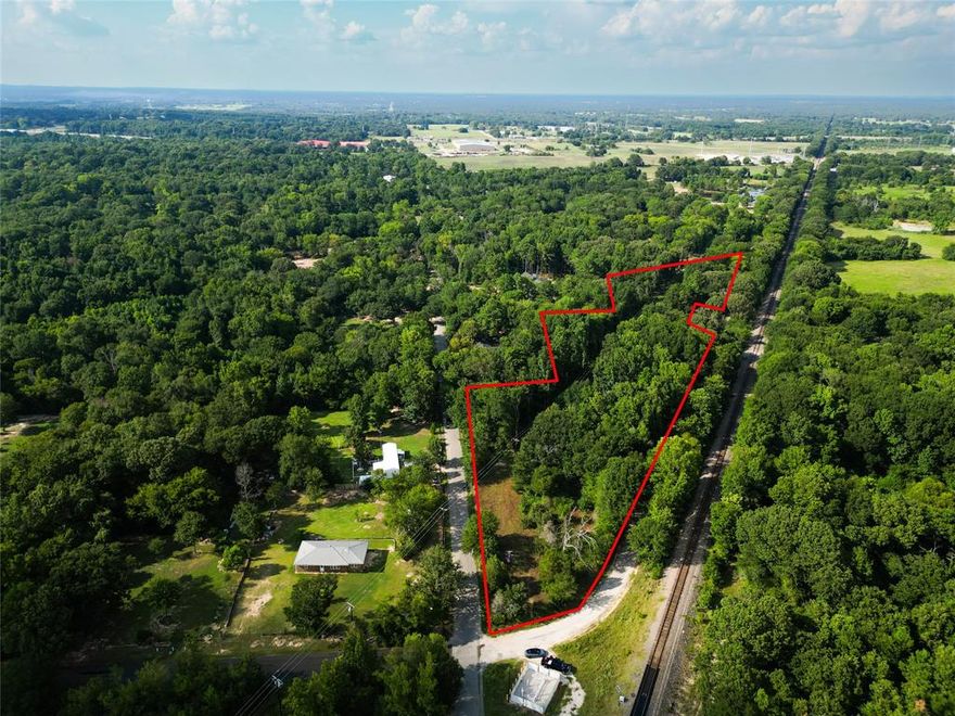 Seller recently cleared this 3.418-acre wooded tract, offering a great opportunity for a homesite or investment. No known restrictions provide flexibility for future use. A survey is available, and the property is ready to sell. Enjoy privacy and space while still being conveniently located just minutes from town. Buyer to verify utilities and intended use.