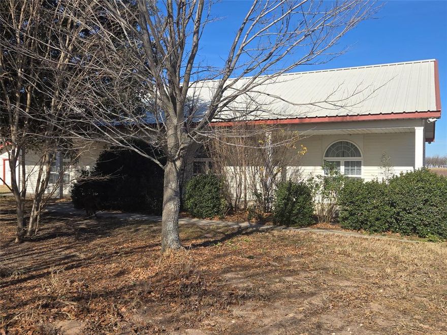 BEAUTIFUL 19.81 ACRE RANCH WITH ABOUT 18 ACRES OF COASTAL GRASS, GOOD FENCES, AND HOME BUILT IN 2004 WITH A METAL FRAME WITH I BEAMS, METAL ROOF, METAL SIDING, 1980 SQ FT. 3 BEDROOMS, 2 BATHS, SPRINKLER SYSTEM IN THE YARD. TREES INCLUDE LIVE OAK, PEACH, APPLE, CHERRY, MAPLES AND CREPE MYRTLES. STORAGE BUILDING WITH SHOP AREA 18 X12 AND WASHER AND DRYER AREA WITH EQUIPMENT SHED ATTACHED 12 X 18. STORAGE BUILDING 12 X 12, APPLIANCES THAT CONVEY ARE COOKSTOVE, REFRIGERATOR AND HOT WATER HEATER BOUGHT RECENTLY. MAKE THIS PLACE YOURS!