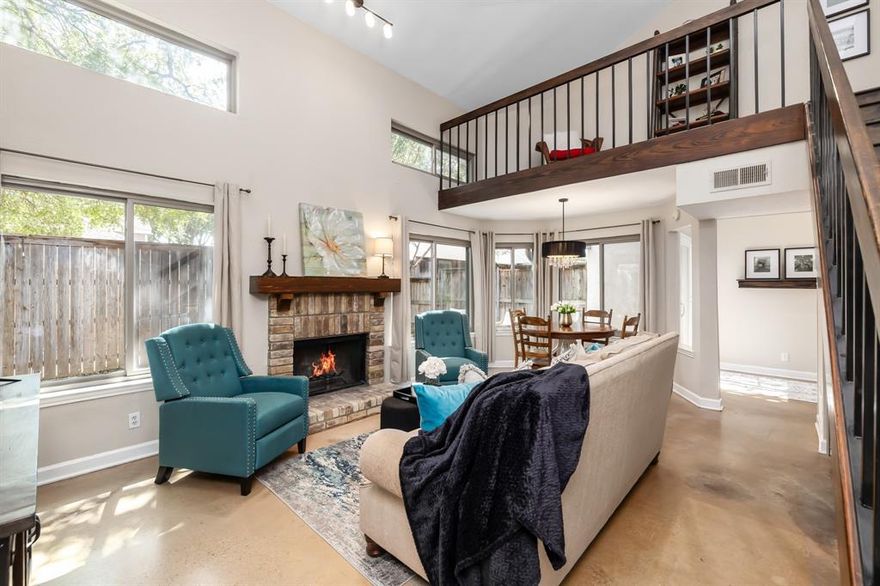 All furnishings are for sale and negotiable. Beautifully updated move in ready 2 story condo with dual primary suites is perfectly placed and lovingly maintained! Gorgeous open floorplan with great spaces to relax and entertain.  Large living room with wood burning fireplace opens to two dining areas, updated wet bar with beverage fridge, sink and ice maker and kitchen featuring SS counters, smooth cooktop range and great cabinet space.  Bathrooms updated with new vanities, showers and freestanding tub in first floor bath.  Upstairs master has bonus room that could be a sitting area or office.  It also features a private balcony perfect for relaxing, or enjoying your morning coffee. The upstairs loft is a perfect place for an additional work area or reading nook. The generously sized backyard is filled with mature trees and has supreme privacy! This low maintenance unit is perfectly thought out! Includes garage and assigned parking space. Additional updates include windows, hardwood floors, tankless water heater, double paneled doors in laundry and study closet, and mirrored closet doors. The Mediterranean-style community offers two pools, a hot tub, a cabana, and pool restrooms.  HOA dues cover exterior maintenance & insurance, water sewer and trash. Conveniently located within Plano ISD and within walking distance to a park and school.  Enjoy easy access to top-tier shopping, dining, DNT and PGBT-blending luxury and convenience.  Don't miss the 1-car garage and 1 reserved parking space all included! WOW!