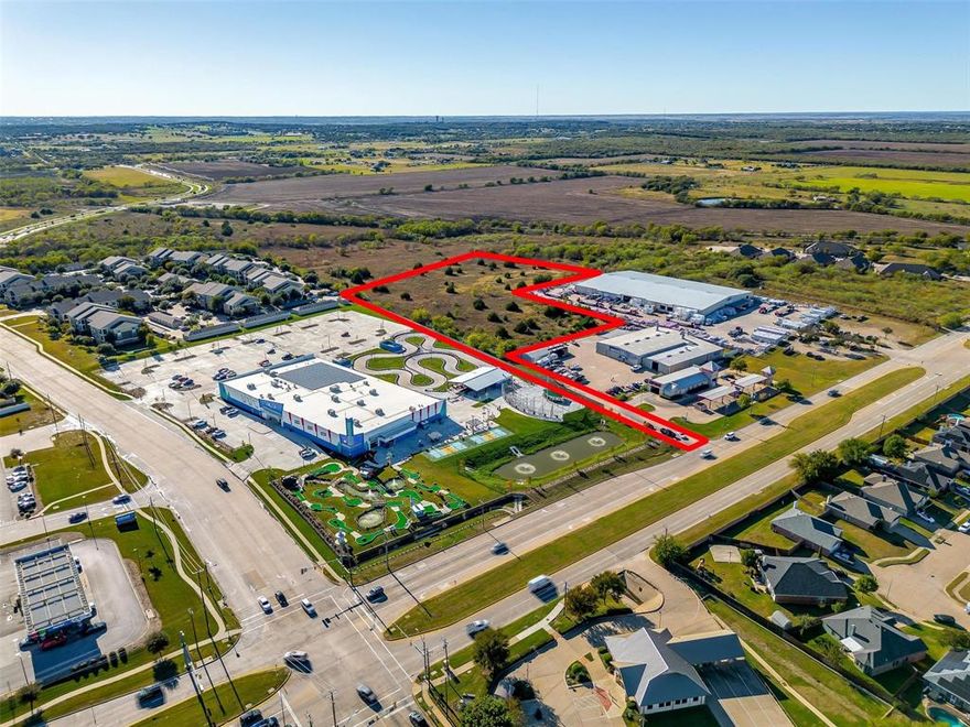 Discover a fantastic opportunity with this 6-acre commercial property located in a highly trafficked area of Burleson. This site offers excellent visibility and accessibility, making it ideal for a new commercial development. Positioned alongside popular establishments such as Alley Cats, ABC Roofing Supply, and Johnson Fiberglass, this property benefits from a bustling business environment and steady flow of local and pass through traffic on the John Jones, FM 731, thoroughfare. Whether you’re planning a retail complex, service center, or office development, this property provides an ideal setting for growth. Don’t miss out on the chance to establish your business in a thriving part of Burleson!