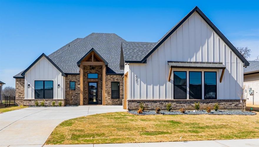 Stunning Custom Built Home by Aubree Homes in the acclaimed Thomas Crossing, home of the Southern Oaks Golf and Tennis Club is a must see!  This 3 Bedroom 2 and a half bath Golf Course home has all the upgrades including a modern linear fireplace, large covered patio, quartz countertops throughout, upgraded appliances, dual zone wine refrigerator, freestanding master tub with separate shower, sprinkler system, tons of storage, eve pugs for holiday lights and a golf cart garage. One year golf membership is included with purchase of home.  Home is complete and move in ready!