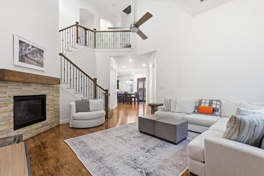 Welcome to 2511 Charlie Bird Parkway. Ideally positioned within the sought-after Mustang Crossing community in Farmers Branch, this well-maintained garden home offers direct access to The Grove Park, the Rose Garden, and scenic walking trails; creating a setting that supports an active, walkable lifestyle. With dining, daily conveniences, and nearby light rail all within walking distance, the location offers a rare combination of accessibility and everyday ease. Inside, the home features a flexible three bedroom, three full bathroom layout designed to adapt to a variety of needs. The main living area is filled with natural light, highlighted by vaulted ceilings, recently updated hardwood floors, and a stone gas fireplace that serves as a central focal point. The open flow between the living, dining, and kitchen spaces supports both comfortable daily living and easy entertaining. The kitchen is thoughtfully appointed with granite countertops and stainless steel appliances, offering both function and style. A first floor bedroom with a full bath provides an ideal setup for guests, a home office, or a secondary living space. Upstairs, the primary suite offers a private retreat with an updated bathroom featuring dual vanities, a soaking tub, separate shower, and a spacious walk in closet. Additional improvements, including a recently replaced HVAC system, provide added peace of mind. Residents enjoy access to community amenities including landscaped green spaces, walking paths, and the nearby park system just steps away. With convenient access to major highways, DFW Airport, and downtown Dallas via light rail, this home is well suited for those seeking both low-maintenance living and a highly connected location.