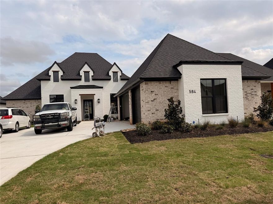 Absolutely gorgeous new construction home in gated Canal Place! This 2754sf home is all on one level and designed with flexibility in mind - whether you need a private retreat or an entertaining paradise, you're sure to fall in love. The professional landscaping and tasteful mix of white and natural brick offer immediate curb appeal. As you step inside, you'll notice the wide-open floor plan with abundant natural light and great attention to detail throughout. The crown molding and modern fixtures bring elegance while the wood-look tile offers convenience without sacrificing style. The gourmet kitchen features stainless appliances, a large pantry, and stunning center island - sure to make any meal a breeze. The primary suite is a true retreat with enough room for a sitting area and spa-like ensuite bath complete with soaking tub and tiled shower. The three additional bedrooms offer space for family, guests, or maybe a dedicated home office while the two additional full baths ensure privacy and convenience for everyone. Outside, you'll love spending time in the sun with the large back patio perfect for hosting summer BBQs and room to add a fire pit or even a pool! Don't wait, schedule your private tour today!