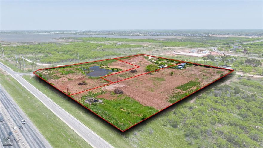This prime commercial land opportunity is located at the high-traffic corner of HWY 83-83 and FM 707 in Abilene, TX, directly across from the Abilene Clay Sports facility. Offering maximum visibility and accessibility, the property is currently divided into three separate parcel IDs but can be purchased as a whole or subdivided to meet your specific development needs. Sewer and water lines are available, making development more streamlined and cost effective. Some engineering work and site data have already been completed, helping to accelerate project planning. Surrounded by multiple new housing communities and commercial developments, this area is experiencing rapid growth and increasing demand. With nearby restaurants, hospitals, shopping centers, and key traffic exposure, this location is ideal for retail, medical, dining, or multi-use projects. Don't miss this rare opportunity to invest in one of Abilene's most strategic and up-and-coming commercial corridors.