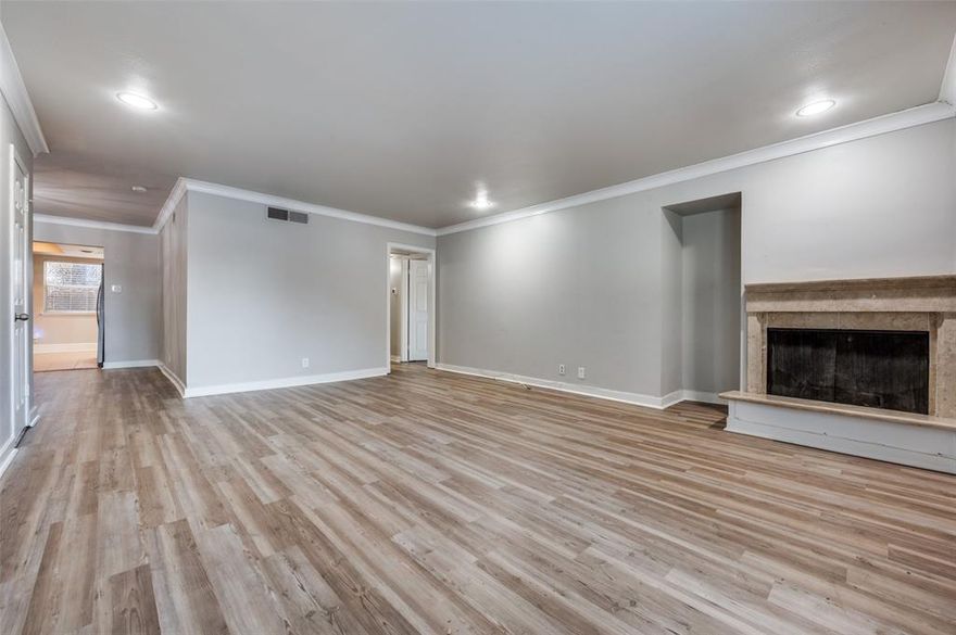 *****  MAJOR PRICE ADJUSTMENT BY MOTIVATED SELLERS ** DON'T MISS OUR OPEN HOUSE ** SUNDAY  MAY 31  2:00-4:00 PM *****  Two bedroom, two bath condo in the conveniently located and gated Paradiso complex. This move-in ready is located on the ground floor and features an open-concept floor plan. The spacious living room with fireplace opens to the dining room and kitchen. Kitchen amenities include granite countertops, stainless appliances, and rear entrance with easy access to parking. The primary bedroom is ensuite and offers two walk-in closets and direct access to a private patio. The secondary bedroom is large and has abundant space for an office or sitting room with access to hall (full) bath. Full-size laundry area off the kitchen with built-in cabinets. This community features a sparkling pool complete with waterfalls, cabana, and built-in grills. Prime location near Central Expressway & Walnut Hill Lane grants easy access to shopping and entertainment as well as SMU, Preston Hollow and downtown.