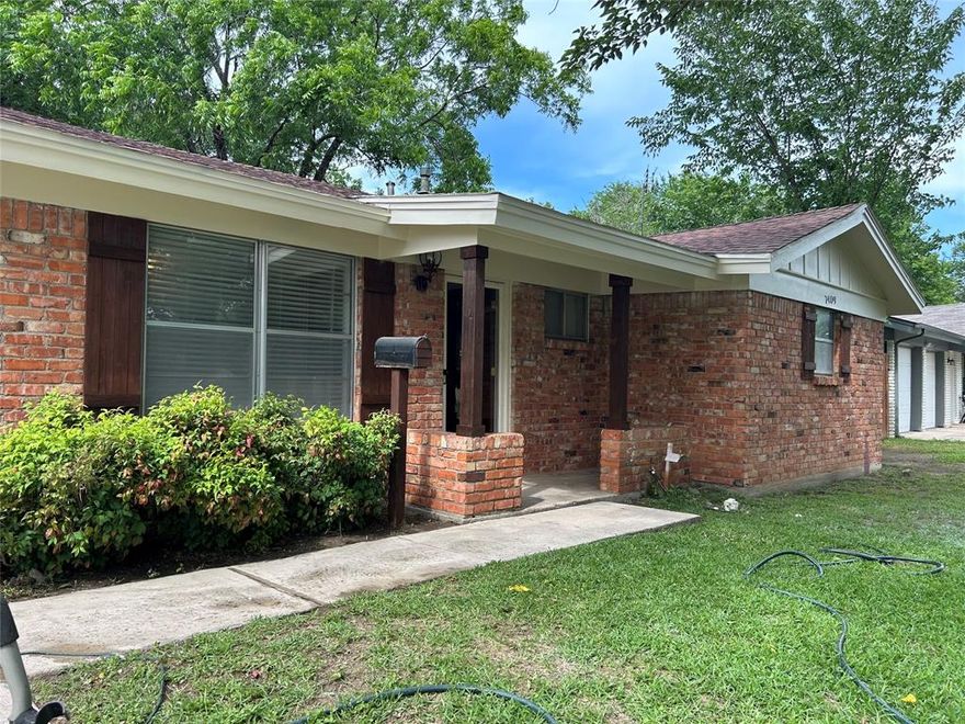 House located in the College Hill Addition by Fort Worth Christian. Great neighborhood. This brick home has beautiful trees in front and back yard and a double garage facing the street. With an open concept in kitchen and living area, you walk around the corner to a great room with a wood burning fireplace. Ther are two bedrooms and two full baths. A good sized back yard with chain link fence. Come make this your new home!