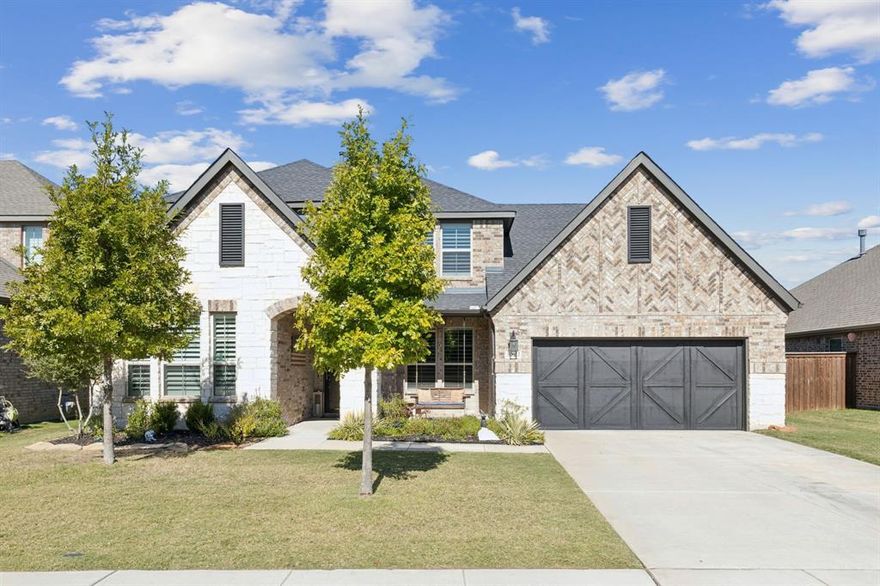 Welcome home to this beautifully designed residence with soaring two-story ceilings and an open-concept floorplan. You'll love the bright, airy atmosphere filled with natural light—perfect for gathering, entertaining, or simply relaxing.

The chef’s kitchen is a true showstopper, featuring an oversized island with abundant storage,energy efficient appliances, double ovens, and sleek finishes that blend function and beauty. Whether hosting a dinner party or enjoying a casual breakfast, this kitchen is the heart of the home.

The air-conditioned garage offers versatile space ideal for a workshop, home gym, or hobby area, providing flexibility to suit your lifestyle.

Step outside to your private backyard retreat, bordered by a peaceful treed pasture for extra privacy. A spacious covered patio invites you to create your own outdoor oasis—perfect for barbecues, gatherings, or quiet evenings under the stars.

Located just half a block from the community pool, this is a very family friendly neighborhood with top-tier ammenitiesT. In addition,  it is located in the highly sought-after A+ rated Prosper ISD and has access to state-of-the-art schools.

This property combines comfort, sophistication, and an unbeatable location—offering the perfect place to live, work, and play.