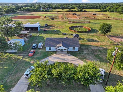Photo of 711 County Road 701, Cleburne, TX 76031 (MLS # 21329665)