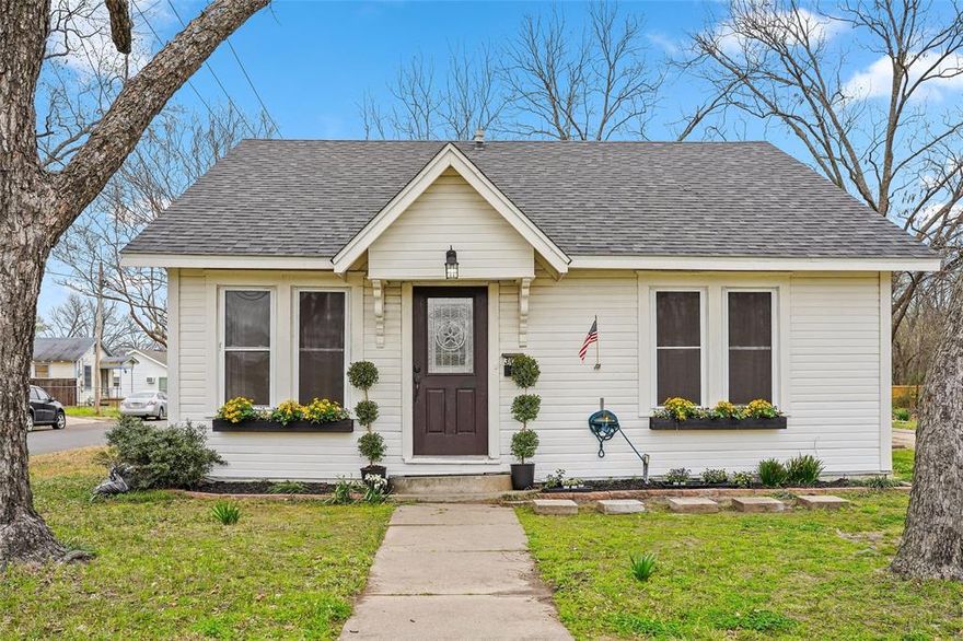Move-in ready and full of charm! Situated on a beautiful quiet corner lot, this fully remodeled 2-bedroom, 1.5-bath home features brand-new kitchen appliances, updated bathroom fixtures, a mostly fenced backyard with minimal convenient gaps for easy access. The flexible floor plan offers the potential for a third bedroom — the formal dining area easily doubles as a playroom, home office, or extra bedroom to suit your needs. Modern upgrades meet classic character throughout, including easy-to-maintain top-grade laminate flooring, fresh paint, thick trim, and elegant curved entries. Designed for both comfort and functionality, the home includes a side entrance through a bedroom for near-immediate access from the driveway and a back door that leads directly to the utility room off the kitchen in which flooring will be complete prior to close, providing seamless everyday convenience. A generous concrete pad is perfect for basketball, bike riding, or extra parking. Inside, enjoy neutral tones accented with gold hardware, detailed baseboards, a walk-in-closet in the master, and graceful archways — a perfect blend of timeless style and tasteful modern updates. Additional highlights: AC system warranty and 200-amp electrical service upgrade for peace of mind. Located within walking distance to Celebration Plaza, restaurants, grocery, shopping; and just minutes from SSISD schools, this home offers the ideal balance of style, convenience, and practicality. Wonderful as a starter home or downsizing opportunity!