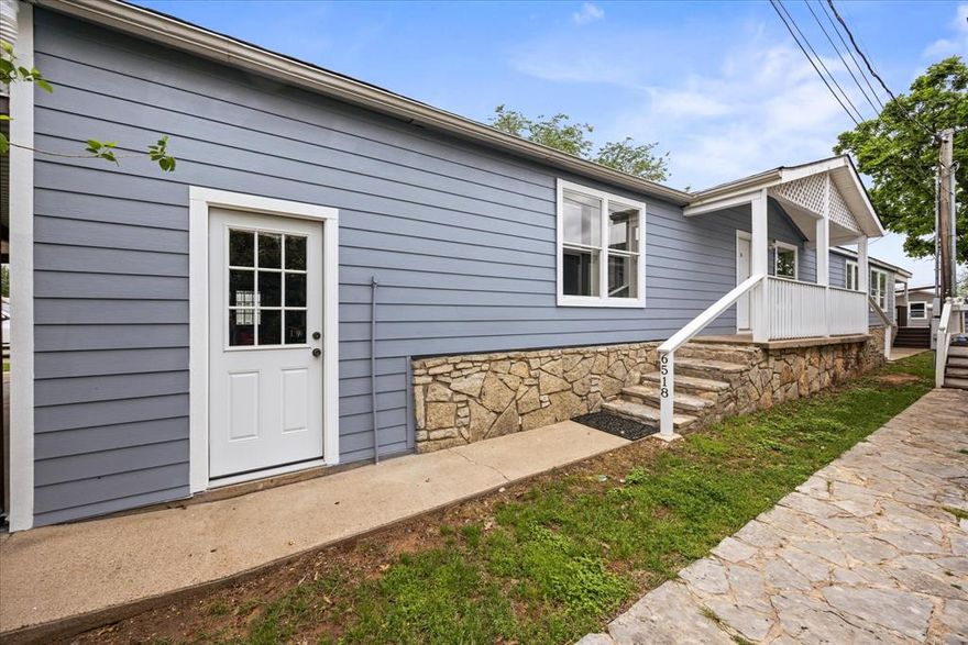 Lake living done right—fully renovated, move-in ready, and built for entertaining inside and out. If “lake house” means space, comfort, and getting on the water fast - this home delivers.

Every inch of this Granbury lake home has been updated, including fresh interior texture and paint, crown, luxury vinyl plank flooring throughout, and a completely redesigned kitchen and baths with new appliances, quartz countertops, and abundant cabinetry. The kitchen is built for gathering, with a large island, pantry, and high-top seating, all opening to bright living spaces filled with natural light.

With 3 bedrooms and 2 baths, the layout offers flexibility and room to spread out, including two living areas and multiple dining spaces. The primary suite is oversized at 21x14, featuring a spacious bath with double sinks, separate vanity, extensive linen storage, a custom closet, and a bonus 12x11 room—perfect for an office, nursery, 4th bedroom, or private retreat.

Step outside and you can see all the possibilities for entertaining and fun. A large covered deck overlooks the patio, private dock, and water, with the second living area opening directly to the outdoors—ideal for hosting family and friends. The brand-new dock (Feb 2026) puts you just seconds from open water on Lake Granbury—no long idle rides, just get on the lake and go.

Major exterior updates include a new roof (Dec 2025) and all new siding, giving peace of mind for years to come. There’s also a large garage-style storage area with plenty of room for your 4-wheeler, tools, lake gear, and boat accessories.

For the money, it’s hard to find this combination of updates, space, and direct water access. If you’re looking for a lake house that’s ready to enjoy from day one - grab this before the summer rush!  Owner is a Texas licensed real estate agent.
