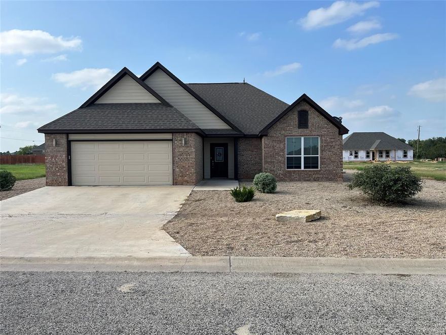 BEAUTIFUL NEWER HOME IN EXCELLENT CONDITION.  This 3-2-2 brick home features stained concrete flooring and upgraded cabinets and other features. Located in Glen Rose school district which is highly rated.  Home is on Coop electric and MUD water for lower utility bills.  Call for appointment to see.