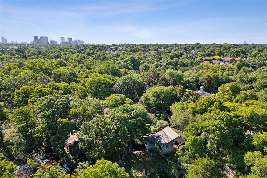 Lush one-acre Preston Hollow lot situated on an idyllic creek offering the perfect location for new construction. Large, level lot with an abundance of mature trees overlooking a serene creek with beautiful water views and tremendous privacy. Insulated cul-de-sac lot in prime location for luxury development. Property sold strictly as is where is.