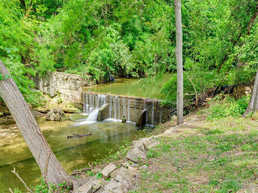 Nestled at the end of a tranquil cul-de-sac in the prestigious Old Preston Hollow, this 1.283-acre cleared  lot presents an unparalleled opportunity for those seeking privacy and elegance. Siding to the serene Browning Branch Creek and boasting views of a breathtaking waterfall, this property offers a unique blend of natural beauty and exclusivity. The secluded setting ensures a peaceful retreat from the bustling city life, while still being moments away from urban conveniences. Imagine your dream home here, where every day ends with the soothing sounds of water and nature's embrace, making every moment at home feel like a private getaway.