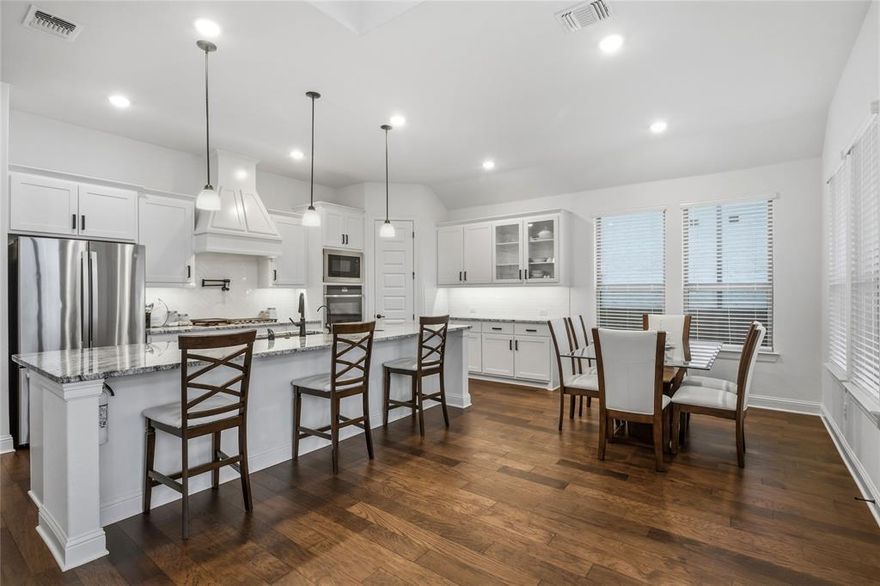 Welcome to 2217 Moore Valley Drive in the highly desirable Trinity Falls community of McKinney. This beautifully designed single-story home offers over 2,600 square feet of thoughtfully planned living space with 3 bedrooms, 2.5 baths, a dedicated office, and a spacious game room. The open concept floor plan creates a seamless flow between the living room, dining area, and kitchen, making it ideal for both entertaining and everyday living. The living room features soaring ceilings, abundant natural light, and a cozy fireplace that anchors the main gathering space.

The chef inspired kitchen features a large center island, gas cooktop, pantry, and stainless-steel appliances, with ample cabinetry and workspace. The private primary suite provides a relaxing retreat with a spa style bath featuring dual vanities, a garden tub, separate shower, and a large walk-in closet. Two additional bedrooms offer comfortable accommodations for guests.

This home is loaded with thoughtful upgrades including a whole home water filtration system, a 7 stage alkaline drinking water system in the kitchen, whole home scent diffuser, Google Nest smart smoke alarms, smart light switches, automated humidity sensors in bathrooms and laundry, indoor and outdoor wireless access points, epoxy garage floors, ceiling mounted storage racks, and a remote controlled living room TV mount.

The covered patio overlooks a spacious backyard ideal for relaxing evenings or entertaining guests. Residents of Trinity Falls enjoy resort style community amenities including pools, playgrounds, dog parks, miles of walking trails, and beautifully maintained green spaces.

Conveniently located near US-75 and just minutes from grocery shopping including Kroger and the upcoming HEB, plus dining, retail, and entertainment throughout McKinney. This move in ready home offers modern comfort, smart technology, and access to one of McKinney’s most vibrant master planned communities.