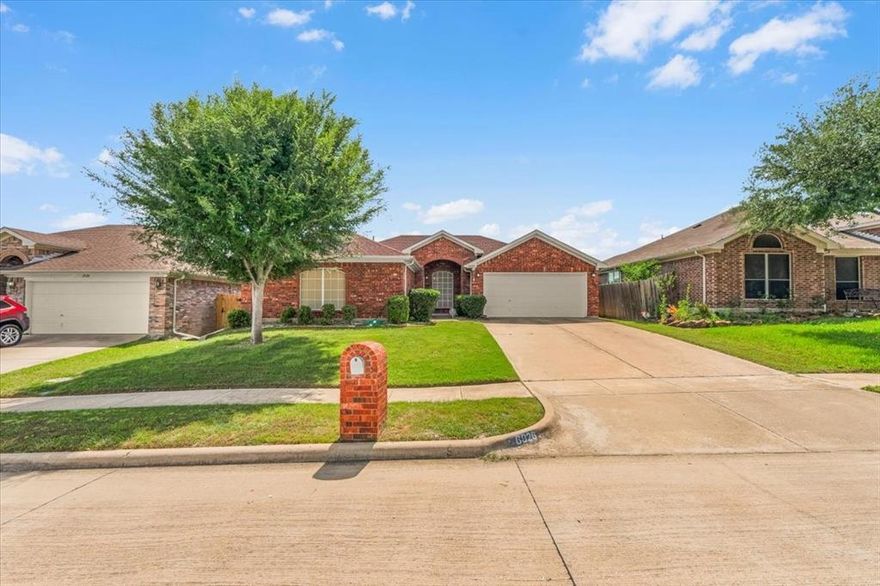 Welcome to this well-maintained 3-bedroom, 2-bath home in the heart of Arlington with NO HOA! Featuring an open-concept floor plan with vaulted ceilings, this home offers a spacious living area with a cozy wood-burning fireplace, perfect for relaxing or entertaining guests. The kitchen flows seamlessly into the large breakfast area, creating an inviting layout for everyday living. A fun chalkboard wall in the eat-in kitchen adds charm and functionality, perfect for grocery lists, family notes, or daily menus.

The private primary suite features a walk-in closet, dual sinks, a garden tub, and a separate shower for a true retreat experience. Step outside to enjoy the oversized backyard with no direct rear neighbors and a peaceful greenbelt behind the property, offering added privacy and a relaxing outdoor setting. The open patio provides plenty of space for entertaining, kids, or pets.

Conveniently located near schools, shopping, dining, and major highways, this home combines comfort, space, and freedom with no HOA restrictions. Don’t miss this opportunity!