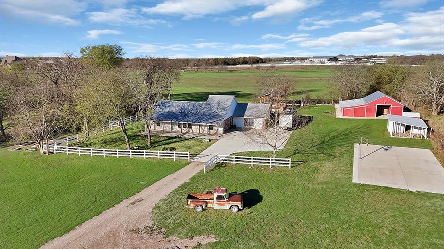 Tucked away on a quiet cul-de-sac in Waxahachie, this beautifully maintained property offers the perfect blend of peaceful country living and modern functionality on a spacious homesite. Step inside to discover an open-concept kitchen and living area that serves as the heart of the home, ideal for entertaining or everyday living. The kitchen features abundant cabinetry, a large workspace, and seamless flow into the living and dining areas. The primary suite provides a private retreat with walk-in shower, generous walk-in closet, and well-designed bathroom layout. Additional bedrooms offer flexibility for family, guests, or office space, while the full laundry room adds convenience and storage. One of the most versatile spaces in the home is the large back multipurpose room, perfect for a second living area, game room, media room, or home gym. Outdoor living truly sets this property apart. The backyard retreat includes a sparkling pool, outdoor kitchen, and expansive yard space ideal for entertaining, relaxing, or enjoying breathtaking Texas sunsets. Garden space allows for growing your own vegetables or flowers, and the property also features a barn gym and chicken coop, offering the charm and functionality of country living with room to pursue hobbies, fitness, or small-scale homesteading. The beautifully maintained yard and outdoor features create a peaceful private setting while still being conveniently located near Waxahachie amenities, shopping, dining, and schools. Whether you're looking for space to entertain, relax by the pool, garden, or simply enjoy the quiet countryside, this unique property offers a rare combination of comfort, versatility, and lifestyle living.
