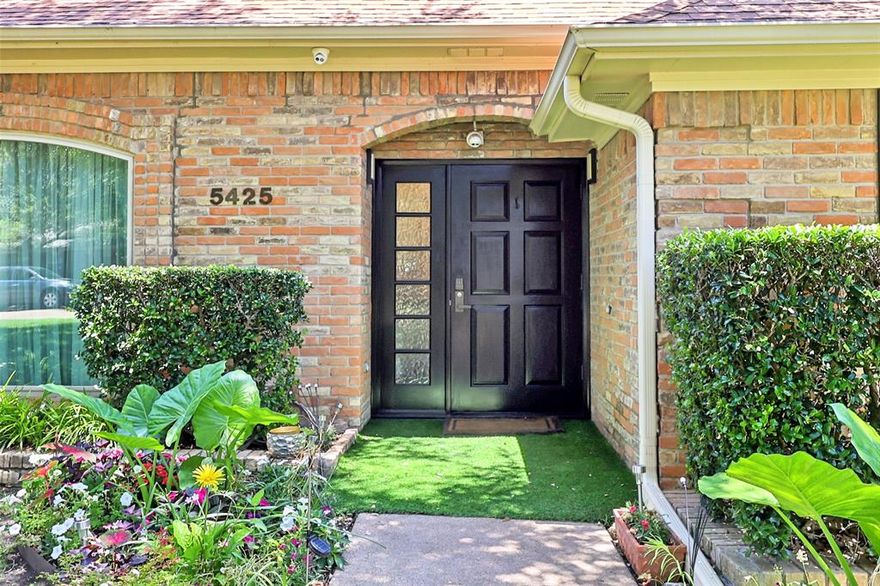 HUGE PRICE REDUCTION – Now $1,090,000 (previously $1,295,000). Exceptional opportunity in the Private School Corridor within an established redevelopment area. Situated on a 16,322 sq ft estate lot, with luxury new construction across the street, this property offers strong potential to remodel, hold, or build new. The existing single-story home is well-maintained and highly livable, featuring 4 bedrooms, 3 bathrooms, 3 living areas, and 2 dining areas. The flexible floor plan includes vaulted ceilings, wood flooring, a formal living room with a fireplace and a wet bar, an atrium, and a split guest suite. The renovated kitchen features a 6-burner gas cooktop, a stainless steel refrigerator, a breakfast bar, and a built-in breakfast nook overlooking the heated solar-powered pool. The primary suite includes dual bathrooms, dual walk-in closets, and an updated bath with a soaking tub, walk-in shower, and bidet. Additional features include a detached 26' x 20' two-car garage with side entry and an electric gate, RV parking, cedar-lined closets, French drains, a covered patio, and a roof replaced in 2021. Large lot, prime location, and multiple options for end users or investors in one of Dallas’ most active growth corridors.