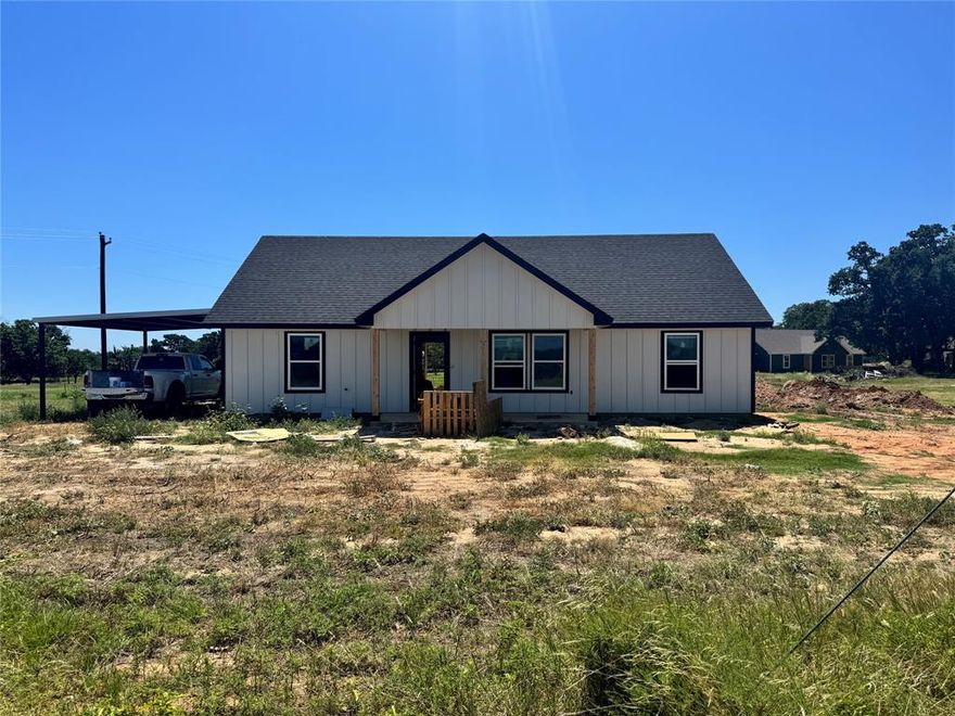 This is a new build located in a new subdivision with NO HOA. This home is a 3 - bed 2 - bath open floorplan home on 1 acre. The kitchen has custom painted cabinets, granite countertops, island, and stainless-steel appliances. The master bath has double vanities and a walk-in shower. The oversized walk-in closet is located in the master bedroom. There is tile throughout house and carpet in bedrooms. The laundry room is large with a door leading out to the attached carport. The back door leads to a large back yard. Ask about builder incentives.
