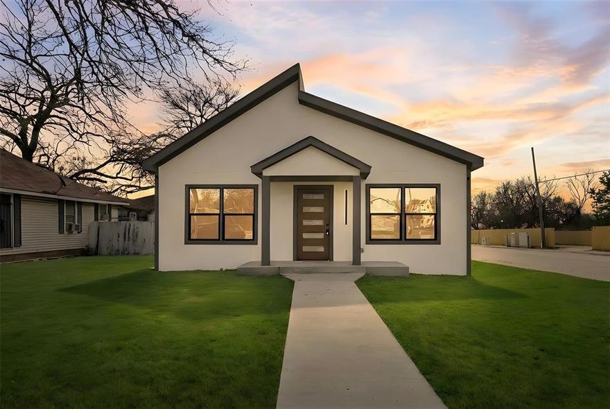 Completely rebuilt and expanded from the foundation and studs, this home offers the rare opportunity to own essentially new construction in an established Dallas neighborhood.

Inside, you’re welcomed by an expansive open layout filled with natural light, clean lines, and modern finishes throughout. The kitchen is the heart of the home, featuring quartz countertops, stainless steel appliances, a gas range, oversized island, and abundant storage—designed for both everyday living and effortless entertaining.

The primary suite offers a true retreat, complete with a spacious walk-in closet and a beautifully finished ensuite bath with dual vanities and a large walk-in shower. A secondary ensuite bedroom provides flexibility for guests, multigenerational living, or a private office. Every bedroom is generously sized, with thoughtful design and ample storage throughout.

Step outside to a rare oversized corner lot with a large fenced backyard—offering endless possibilities to create your ideal outdoor space, whether that’s entertaining, relaxing, gardening, or future expansion.

With the structure fully rebuilt and significantly expanded, this home delivers the comfort, efficiency, and peace of mind buyers seek—without the wait or premium of new construction.

Located with convenient access to downtown Dallas, major highways, shopping, and dining, this is a rare opportunity to own a fully rebuilt home that truly lives like new.