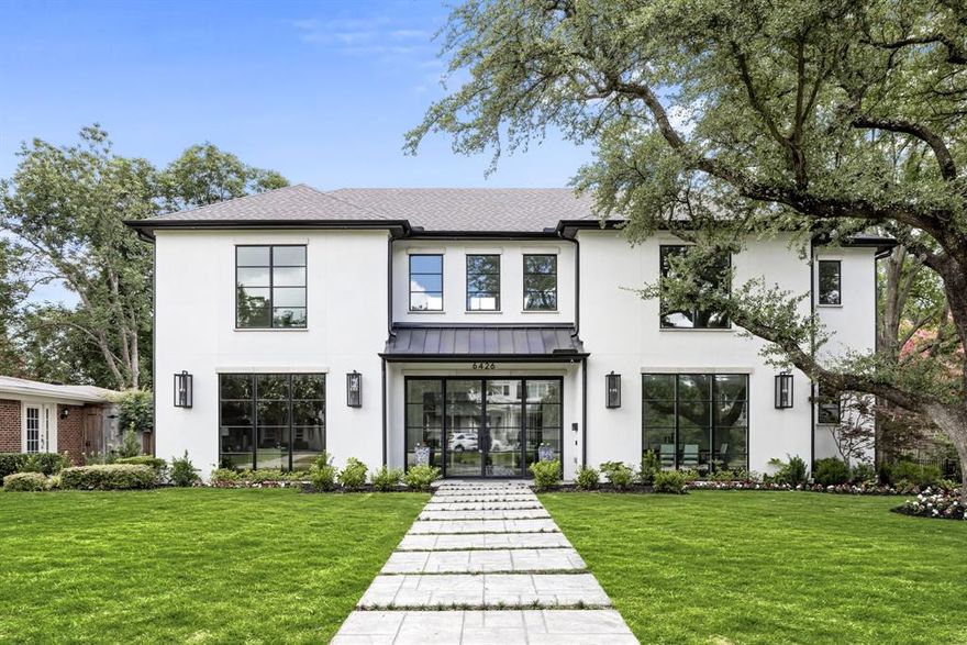 Nestled in the heart of prestigious Preston Hollow, this exceptional five bedroom estate spans 5,524 square feet and features a three car garage. Designed with both grand-scale entertaining and everyday comfort in mind, the home boasts walls of glass and expansive sliding doors that open to a backyard retreat complete with a sparkling pool and spa, full outdoor kitchen with beverage fridge, and a covered patio with fireplace and phantom screens for year-round enjoyment.

The show-stopping chef’s kitchen is anchored by Taj Mahal quartzite countertops and outfitted with top-tier appliances, including a Wolf range, built-in Sub-Zero refrigerator and wine storage, dual dishwashers, an ice maker, and a beverage fridge. The main-level primary suite is a private sanctuary with direct outdoor access, a spa-like bath featuring a separate soaking tub and walk-in shower, and a custom closet with built-in vanity. A well-appointed guest suite on the main floor provides ultimate convenience and privacy.

Upstairs, a spacious game and media room with custom built-ins is flanked by three generously sized guest suites. From its refined finishes to its effortless livability, this remarkable home embodies timeless elegance in one of Dallas’ most coveted neighborhoods.