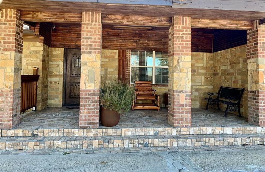 Home located in Casa View Heights, Dallas, featuring a traditional rustic style.
Offers 3 bedrooms and 2 bathrooms, with wood flooring and decorative arches connecting living room and main living area.
Kitchen includes granite countertops, wood cabinetry, stainless steel appliances, electric range, and gas line available for future range conversion.
Bedrooms are spacious and well distributed. The bathrooms have been remodeled with decorative tile and updated finishes.
Backyard features decorative stone tile flooring and covered patio with lighting. Property offers ample parking, with space for up to 6 vehicles in back and 3 vehicles in front, plus electric gated access at front and rear through alley.
Detached garage currently used as storage, with option to convert back to garage.
Additional two unfinished exterior rooms available for completion.
Home is fully fenced front and back.
No HOA.
Near I-30 and I-635, with close proximity to shopping centers, grocery stores, Town East Mall, and Dallas College Eastfield Campus.