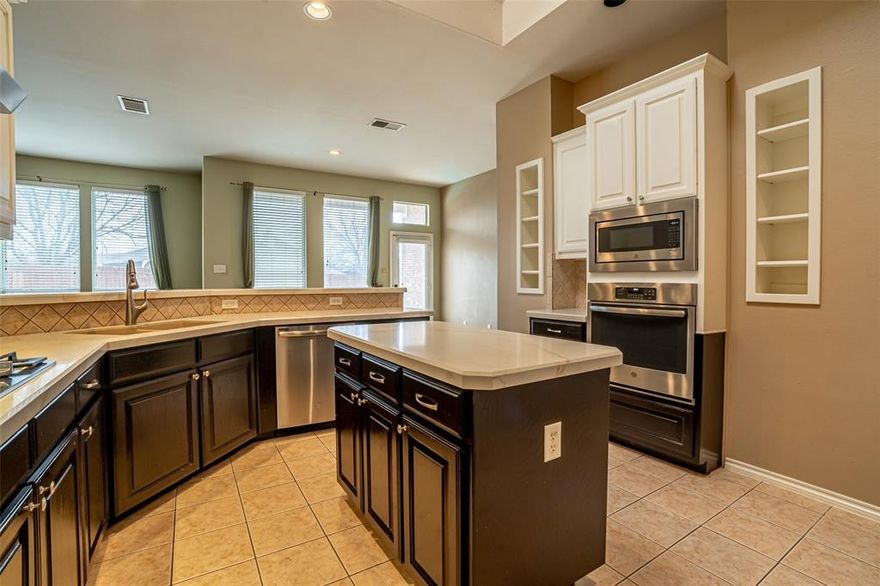 Welcome to this beautifully updated 4-bedroom, 2-bath home offering 2,425 square feet of thoughtfully designed living space in the desirable Trace Ridge community of Fort Worth.

The split-bedroom floor plan provides exceptional flow and privacy, with the spacious primary suite tucked away from the secondary bedrooms. The primary retreat features a large walk-in shower, creating a relaxing space to unwind. At the front of the home, a bedroom with elegant double doors offers the perfect setup for a home office, study, or flex space.

Recent updates add both style and peace of mind. Within the last few years, carpet has been replaced with beautiful wood flooring, stainless steel kitchen appliances have been installed—including a 5-burner gas cooktop—pool equipment has been updated, attic storage has been added, and the pool has been resurfaced with new coping. All bedrooms feature fresh paint, and minor roof repairs have just been completed on the previously installed roof from 2018.

Step outside to your private backyard oasis featuring a refreshing saltwater pool—perfect for Texas summers. The low-maintenance yard allows for more relaxation and less upkeep.

Located within the highly desirable and highly rated Keller ISD, this home offers the perfect blend of comfort, updates, and lifestyle in an area with so many conveniences.