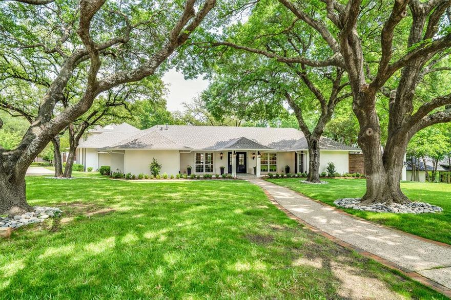 Exceptional property in Northwood Hills Area on gorgeous corner lot. Expanse of French doors and windows view private courtyard and provide beautiful light filled rooms. Versatile floor plan that can accommodate 6-8 bedrooms, 3-5 living areas. Beautiful master suite with sitting area overlooking trees and tranquil green space. Kitchen with large central island, custom cabinetry, quartz counters, Viking appliances, built in refrigerator-freezer, touch faucets. Guest or MIL suite with kitchen, bath, laundry. Detached cottage ideal for studio, guest, or quarters. Oversized 4 car attached garage with additional parking. Quiet tree lined street just one block from White Rock Creek Trail. Technology updates with Z wave based smart home, Alexa hard wired, EV wired circle drive and garage. Extensive list of updates including roof, HVAC, landscaping, drainage, tankless HWHS, and heated bathroom floors. Extra bedroom and bathroom not counting in total in separate guest house.