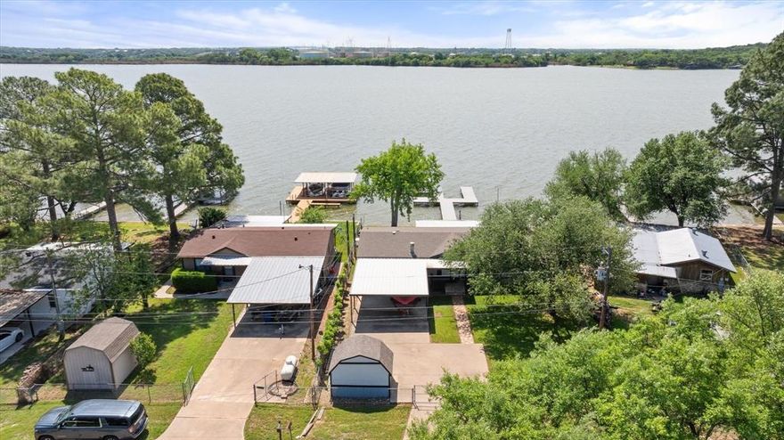 This charming 3 bedroom 2 bathroom LAKEFRONT gem nestled on the main body of Lake Granbury. 3 cozy bedrooms and 2 full baths this home offers comfort and charm. If your lookin for a peaceful retreat, a full time lake lifestyle or an investment opportunity this is the place for you!  There is a brand new dock to welcome you which is ideal for boating, swimming, or soaking up the sun. Don't miss your chance on this one!