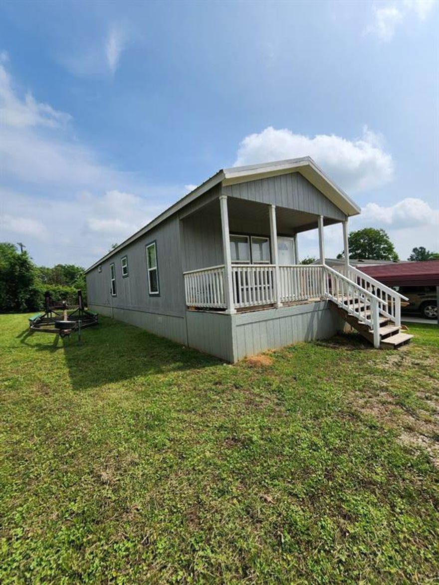 Now is the perfect time to secure your lake home before summer arrives! This charming 2-bedroom, 2-bath home sits on a low-maintenance 0.13-acre lot, making it ideal for easy living. This little Gem has plenty of room inside! Located in a secure gated community, you’ll enjoy fantastic amenities including a pool, dock, playground, boat ramp, and convenient access for fishing anytime you like. Check out Holiday Villages Online,there is so much available!  This is also a great place to live day to day!  Priced Right, Built Right! Good for a college student, not far to TJC! 

Nestled in a clean, quiet neighborhood, this approximately 990 sq. ft. home is about four years old and in excellent condition. It features a handicap-accessible ramp and a relaxing front porch—perfect for enjoying peaceful mornings or evening sunsets.  This is the easy life. Cheaper than apartment living! 

Situated in beautiful East Texas, this property offers the perfect escape from the hustle and bustle. It’s an ideal gathering place for holidays and special occasions with friends and family—or simply a wonderful place to call home year-round. With minimal upkeep required and plenty of nearby shopping and attractions in surrounding towns, you’ll have the best of both relaxation and convenience.

This could also be a great investment into the B&B world. This is a great fishing lake with tournaments often!!  Come take a look!