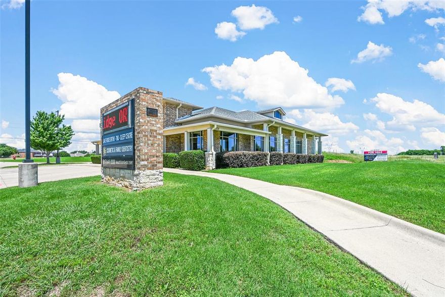 This listing includes an expansive 0.86-acre lot situated directly behind the building at 5539 Lake Ridge Parkway. Located in a high-traffic area adjacent to a daycare, this property is surrounded by a thriving neighborhood and is a primary route for Prairie Lights visitors and Joe Pool Lake enthusiast. Currently functioning as a dental office, the building features: 7 operatories, 6 desk workspaces, 3 private offices (one with a private bathroom and walk-in shower), 3 bathrooms in total,  2 additional rooms being used as a lab and a sterile room, Kitchen, laundry room, 3 closets and an attic with sufficient height for conversion into additional workspaces.  This versatile property is suitable for various types of businesses, offering ample space and a prime location for growth and visibility.  The list price includes all dental chairs and fixtures except what is listed in exclusions.  Price can be negotiated with or without equipment.