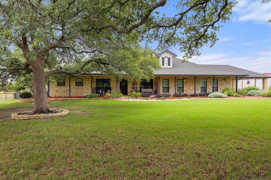 This spectacular gated estate offers the perfect blend of luxury living and recreational paradise on 24+ pristine acres. Built in 2002, completely updated in 2018, residence combines elegant design with modern amenities, creating an unparalleled lifestyle opportunity. Home has 6 Bedrooms, 5.5 Bathrooms, 4,250 Square Feet of thoughtfully designed 2 living spaces, 2 dining spaces plus an office. A Screened Porch for comfortable outdoor relaxation and a Attached 2-Car Carport 25 x 13. Outside you'll find a Pool House Outdoor Kitchen featuring a built-in grill, griddle, sink and bar seating. Enjoy endless family fun in the sparkling pool with slide, hot tub and stone fire pit with seating. The property features a Majestic 300-Year-Old Oak tree, gated entrance for privacy and security, paved driveway, pond, and manicured landscaping. There is a building with over 3300 sqft that is divided by 15x13 storage room, climate controlled 20x40 gym space, two 30x40 storage workshop spaces with electricity. Attached covered 50x13 Motorhome and RV parking and a 1 car carport space. There is also a stable, garden shed and playhouse on the property. Underground storm shelter off the side of the house. Please visit land.com for more photos of the property.