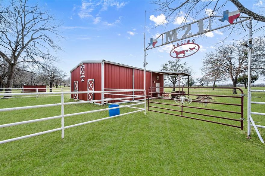 Experience the perfect blend of elegance and country living on this 3.78-acre estate. This stunning home features a spacious open floor plan, a gourmet kitchen with a 6-burner gas range, and a beautifully designed interior that seamlessly blends warmth and sophistication. High ceilings, large windows, and an effortless flow between the living, dining, and kitchen areas make this home perfect for entertaining.
Designed for ultimate livability, the home has a full bedroom and bath downstairs in addition to the primary suite—ideal for guests or multigenerational living. Upstairs, generously sized secondary bedrooms offer ample closet space, while the expansive game room with a built-in bar provides breathtaking views from the balcony of the gorgeous acreage & outdoor oasis. Step outside to experience resort-style luxury in your own backyard. The gorgeous pool & spa offer the perfect escape on warm Texas days, surrounded by lush landscaping and multiple seating areas. Host unforgettable gatherings at the outdoor fire pit and serve delicious meals in the outdoor kitchen.

For golf enthusiasts, the private putting green is a standout feature, allowing you to perfect your short game without leaving home. Equestrian enthusiasts will love the well-maintained 3-stall horse barn, complete with water and electricity, providing a functional and convenient space for caring for your horses. There’s plenty of room for grazing, riding, and training on your own property.

A unique highlight of this estate is its 1.25 acres within the HOA, while the back 2.5 acres are unrestricted—a huge plus for those seeking flexibility.

With plenty of space for entertaining and unparalleled privacy, this property is a rare find. While you’ll feel worlds away on your luxury estate, you’re just minutes from top-rated schools, shopping, dining, & major highways for easy access to the city.