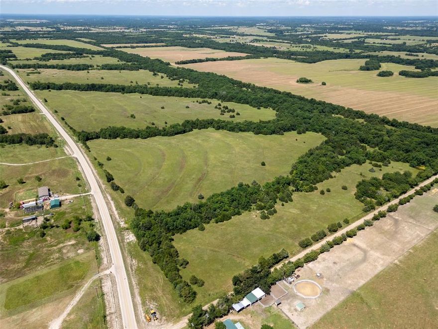 185.80ACS. TBD FM 2649 -LOOKING FOR A PROPERTY WITH VARIETY OF CHOICES FOR ITS USE. CURRENTLY IN AG USE LEASED FOR CATTLE. ENTIRE
PROPERTY IS FENCED NO CROSS FENCE, GOOD PASTURE LAND WITH LARGE POND. ROAD FRONTAGE ON 3 SIDES FM 2649 & CR 3205 & CR 3206.
VERY FEW  PROPERTIES WITH LOT OF ROAD FRONTAGE TO DEVELOP INTO SMALLER TRACTS. ESTIMATED ROAD FRONTAGE 8,560 ft. IF YOU WANTED TO 
BUILD YOUR HOME WITH SECLUSION YOU WOULD HAVE IT ON THIS LARGE TRACT OF LAND.