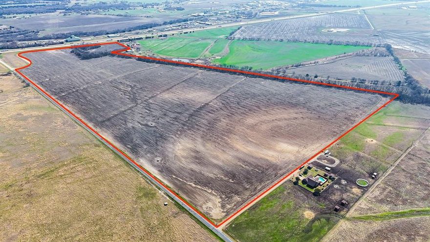 Unlock the potential of over 96 acres of prime agricultural land, ideally situated just south of Waxahachie and conveniently located right off I-35. This property currently showcases thriving crops, a testament to its fertile soil and agricultural viability, making it an excellent choice for farming enthusiasts or investors looking to capitalize on a perfect building site. The expansive landscape offers a blank canvas for your imagination, presenting an array of possibilities for development. Whether you envision expanding existing agricultural operations, establishing a personal retreat, or creating a unique community project, this land provides the ideal setting to bring your dreams to life. The proximity to I-35 ensures easy access for transportation, making it a practical choice for agricultural logistics or future development. Surrounded by the natural beauty of the Texas countryside and the charm of Waxahachie, this property not only promises a productive agricultural future but also the opportunity to enjoy a serene lifestyle away from the hustle and bustle of city living. The land's current cultivation with crops adds immediate value, while its expansive size allows for diverse uses, from livestock grazing to tourism ventures. Don’t miss this rare opportunity to own a substantial piece of land that combines rich agricultural potential with a strategic location. Seize the chance to invest in your future and create the vision you’ve always dreamed of on this remarkable property!