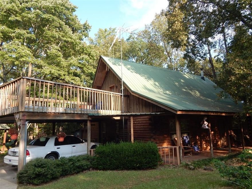 Welcome to Your Dream Log Home on 2 Acres!

Don’t miss this stunning log home nestled on 2 acres in a peaceful rural setting. Built with strength and charm, this property offers a wonderful blend of rustic character and comfortable living.

Step inside to a spacious open living and dining area — perfect for entertaining — featuring an attractive brick floor that adds warmth and texture. The kitchen provides abundant storage and functionality. A full bathroom is conveniently located on both the main and upper levels.

The main-floor primary bedroom is a generous size and includes two closets for plenty of storage. Upstairs, you’ll find a very large second bedroom with access to a spacious balcony over the carport — ideal for relaxing and taking in the scenic views. The third bedroom is designed as a loft that overlooks the living room and would also make a fantastic office or cozy reading nook.

Outside, enjoy country living at its best with both front and back porches stretching the full length of the home — perfect for morning coffee or evening sunsets. A handy storage shed is included for your tools and mower.

This home has so much to offer — embrace the country lifestyle and make it yours today!