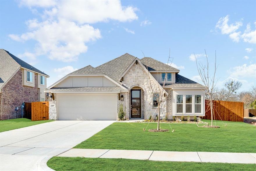 NEW! NEVER LIVED IN. Available to Move-In NOW! Bloomfield’s Cypress II is a versatile two-story plan offering 4 bedrooms, 3 full baths, and flexible spaces designed for modern living. From the curb, the brick-and-stone exterior with arched entry and professional landscaping delivers timeless appeal, while an oversized lot provides extra outdoor space for privacy, play, or entertaining. Inside, the Family Room is anchored by a wood-burning fireplace and tall windows that fill the space with light, flowing seamlessly into the Breakfast Nook and Kitchen. The Kitchen is appointed with Granite countertops, stainless steel appliances, custom cabinetry, and a walk-in pantry, plus a buffet in the dining area for extra storage and serving space. A private Study with dual doors sits off the entry, while the large Primary Suite on the first floor includes a dedicated sitting area, spa-like bath with dual sinks, soaking tub, separate shower, and a huge walk-in closet with built-in shelving. 2 secondary bedrooms downstairs each have walk-in closets and share a full bath, while the laundry room, linen closet, and under-stair storage add functionality. Upstairs, a spacious Game Room serves as a second living area and is joined by another bedroom and full bath, creating a private retreat for guests or family. Throughout the home, Laminate Wood flooring in main areas pairs with neutral finishes for lasting style and easy upkeep. Outdoors, enjoy a covered back patio for cookouts, a fenced yard with fresh sod, stone-edged flower beds, and a sprinkler system that keeps landscaping vibrant year-round. Call or visit today to learn more!