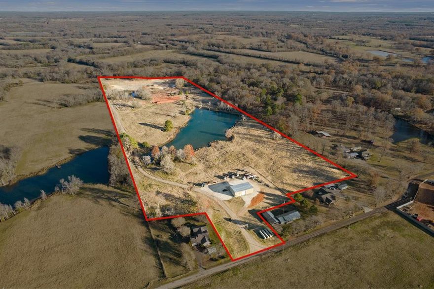 Multi-use rural acreage in Titus County! Only minutes from town, this 37.89 acre tract is the perfect place to live, work, or play! A large shop sits on property, complete with an office, storage room, bathrooms, and multiple overhead doors. Looking for somewhere to build your dream home? This is it! Water, electric, and sewer are already on site. The property is fully fenced with 2 ponds as well. Great hunting and fishing! The possibilities are endless... call to schedule a showing today!