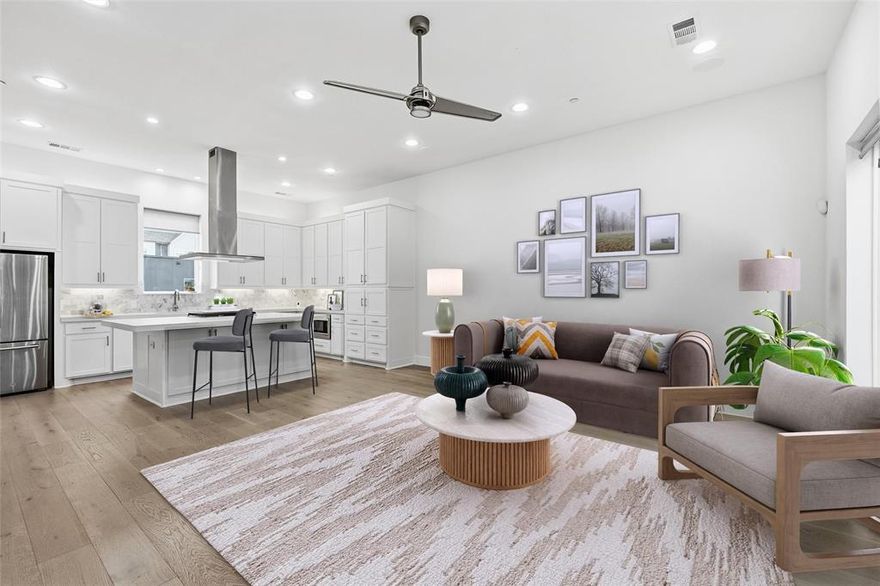 Discover modern living just two blocks from the vibrant Lower Greenville area in this stunning condo that perfectly blends style, comfort, and location. The main level features soaring 11-foot ceilings, bright natural light, and an open floor plan designed for effortless entertaining. Engineered hardwood floors run throughout, complemented by a spacious kitchen with a huge island ideal for meal prep or casual dining. The refrigerator, washer, and dryer all convey, making this home truly move-in ready. Both bedrooms are thoughtfully positioned on the third floor, each offering large walk-in closets and private ensuite bathrooms for maximum comfort and privacy. On the first level, step outside to your own private, fenced-in patio featuring low-maintenance turf and a gas grill hookup—perfect for relaxing or hosting guests. Additional highlights include a gated entrance for extra security and an unbeatable location just moments from top-tier dining, shopping, and entertainment. This is urban living at its finest in one of Dallas’s most sought-after neighborhoods.