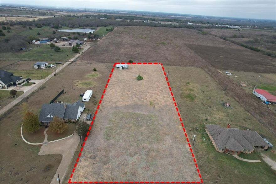 Tranquil 2-acre country parcel in Kaufman, just minutes from Dallas. Level to gently rolling land with good drainage, privacy, and a clear footprint ready for a custom home, barn, or retreat. Utilities nearby. Enjoy wide rural views, open space for gardens or animals, and easy access to highways, shops, and parks. Is located in a USDA-eligible area. Includes survey-ready parcel information. Schedule a showing to visualize your build.